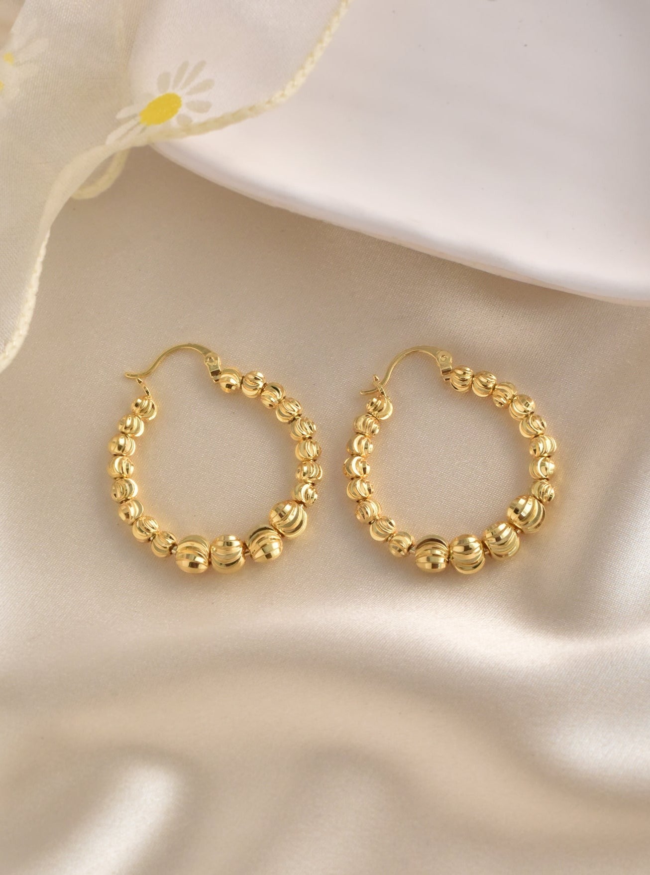 Designer gold clearance hoops