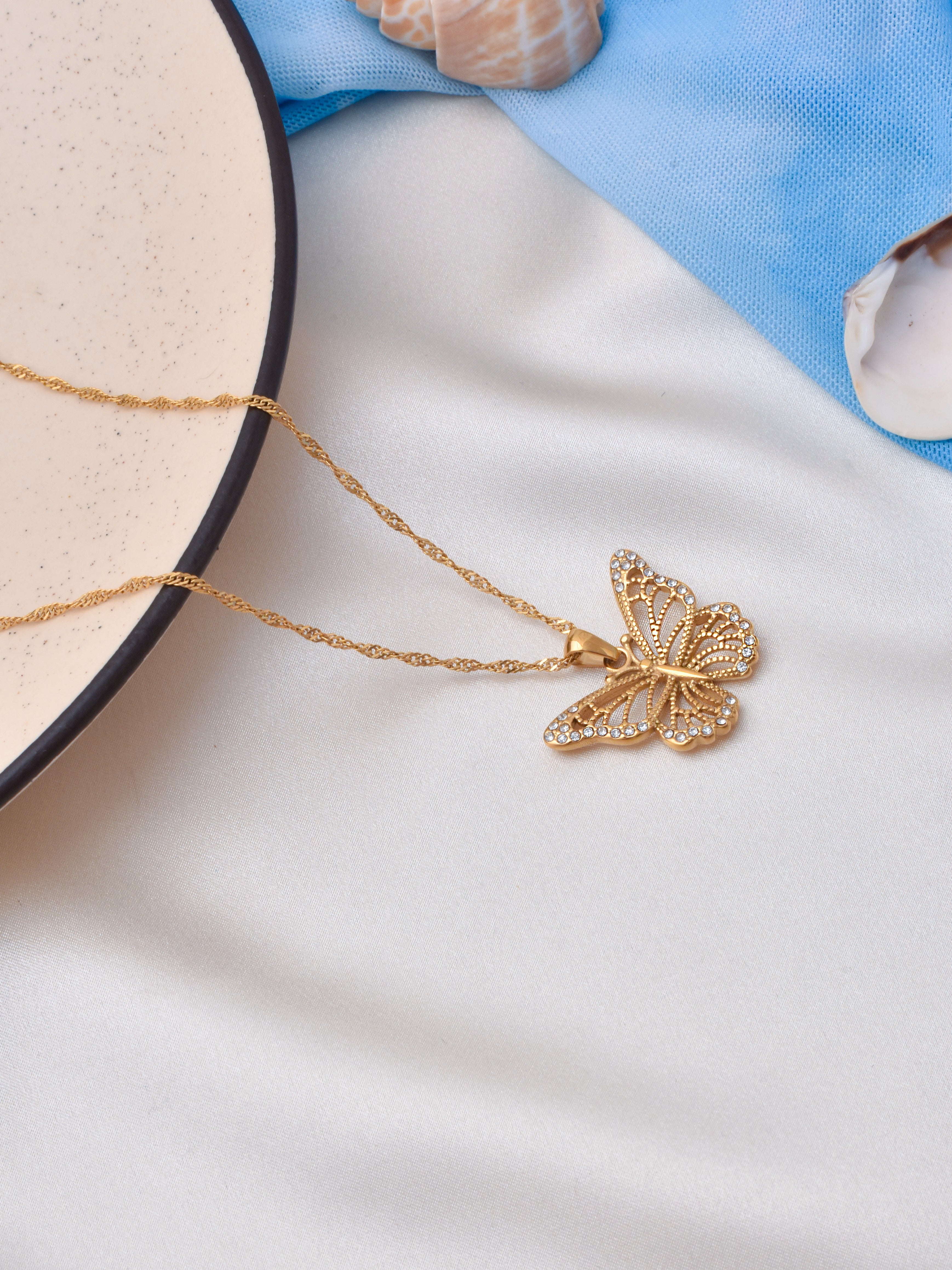 Gold hot sale butterfly locket