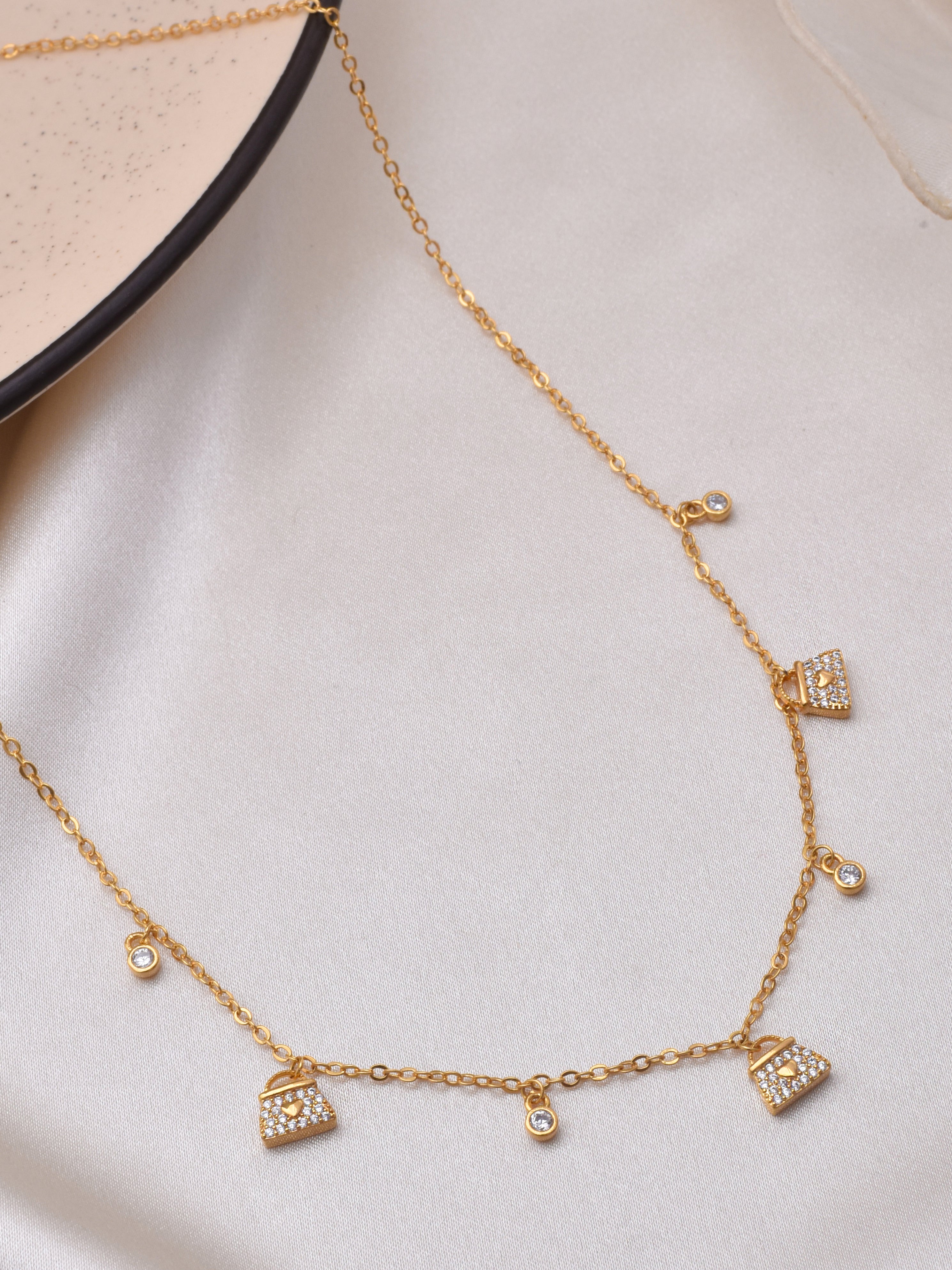 22 Karat Gold Charm Bracelet | Wrist jewelry, Gold necklace designs, Gold  bracelet simple